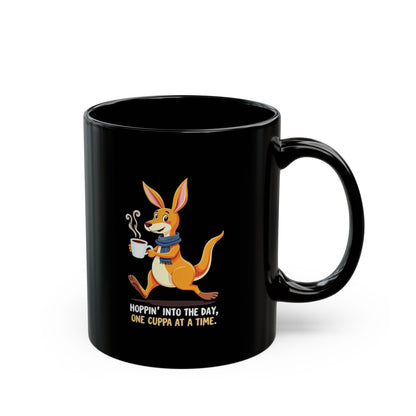 Black coffee mug with cartoon kangaroo holding a cuppa, text reads Hoppin' Into The Day One Cuppa At A Time