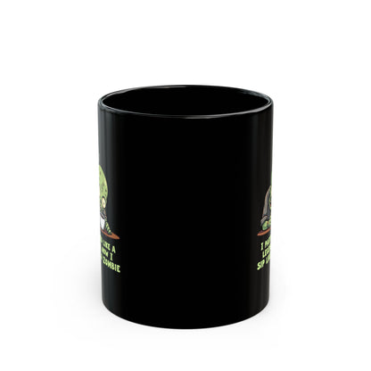 Black coffee mug with cartoon zombie graphic and funny party quote, 11oz novelty gift mug for mates