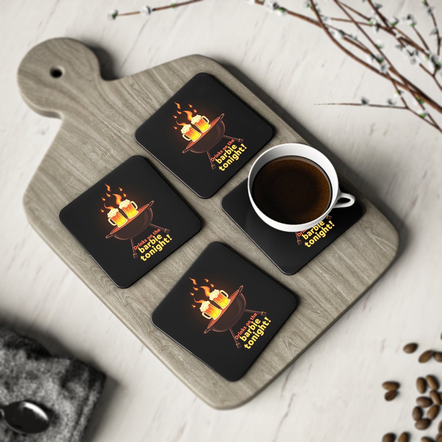 Set of 4 black coasters with flaming BBQ and beer mugs design, 'Drinks on the barbie tonight!' — funny Aussie gift