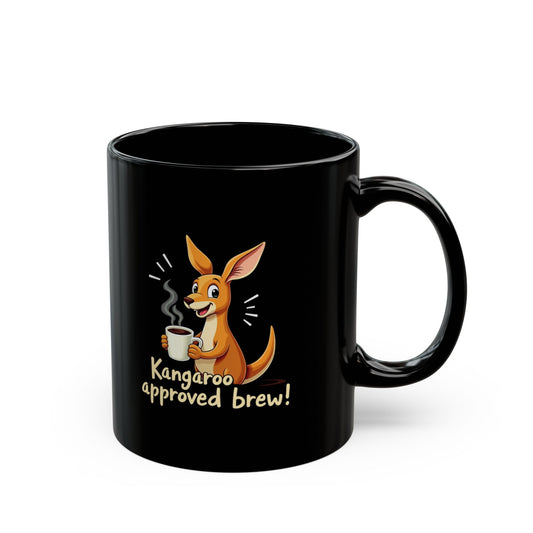 Black coffee mug with cartoon kangaroo holding a cuppa, text reads Kangaroo approved brew. Funny Aussie gift mug.