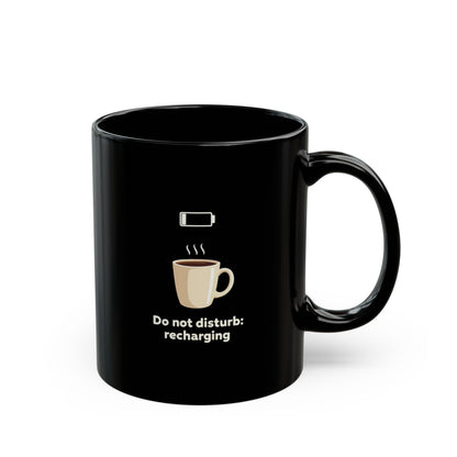 Black coffee mug with low battery icon, steaming coffee graphic and 'Do not disturb: recharging' text