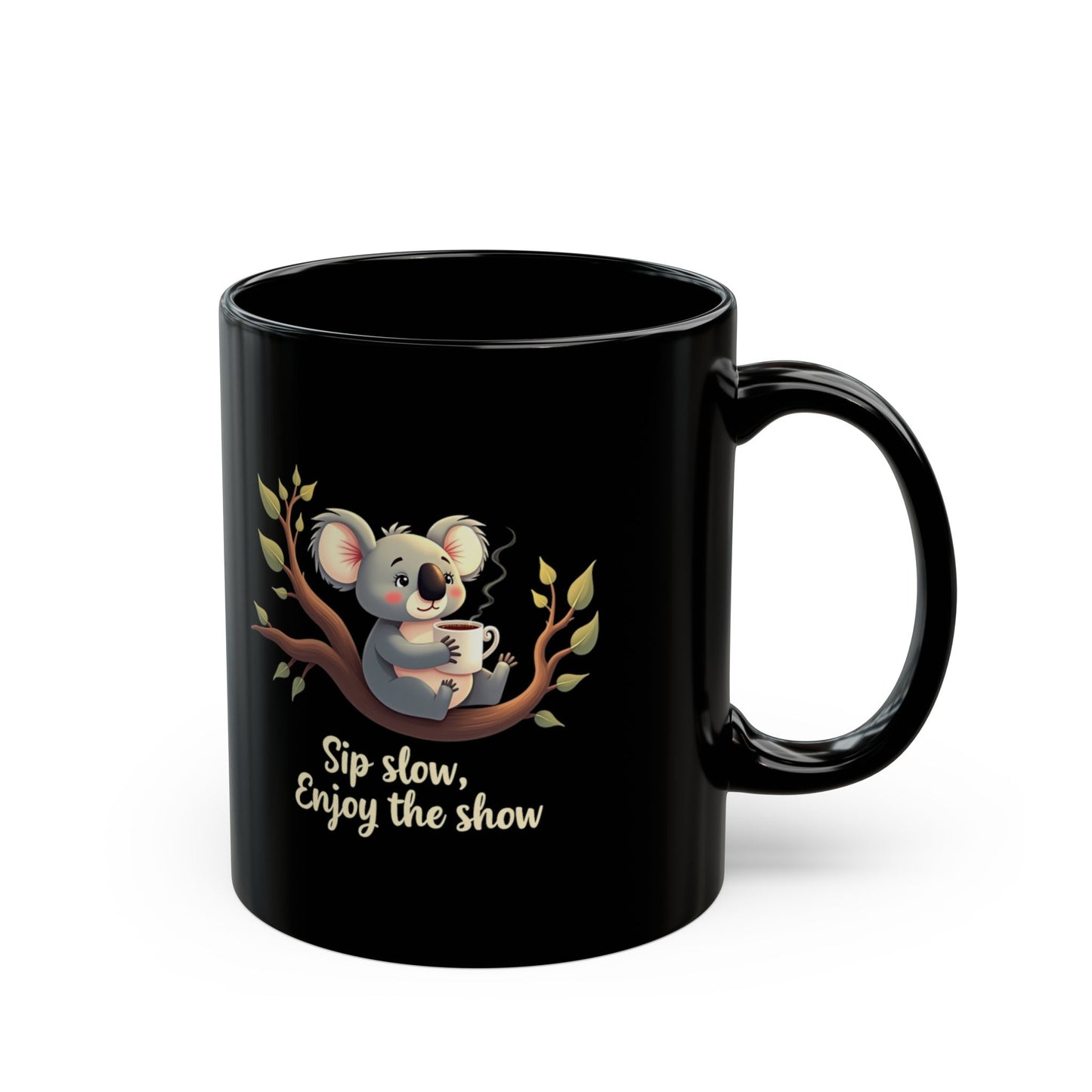 Black ceramic coffee mug with koala on branch holding a cuppa, text reads Sip Slow Enjoy the Show