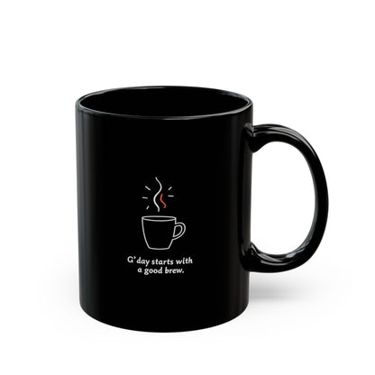 Black ceramic coffee mug with steaming cup illustration and 'G'day starts with a good brew.' text, 11oz