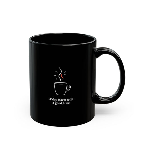 Black ceramic coffee mug with steaming cup illustration and 'G'day starts with a good brew.' text, 11oz