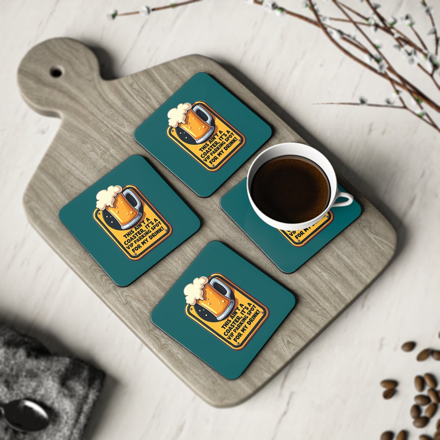 Set of 4 teal funny beer coasters with VIP parking joke design on wooden board with coffee cup