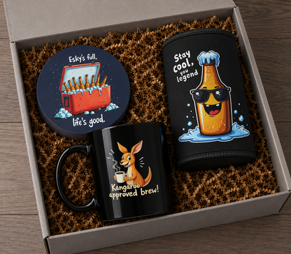 Pub Crawl gift bundle in box: black kangaroo mug, stubby cooler, and esky coaster set on brown crinkle fill
